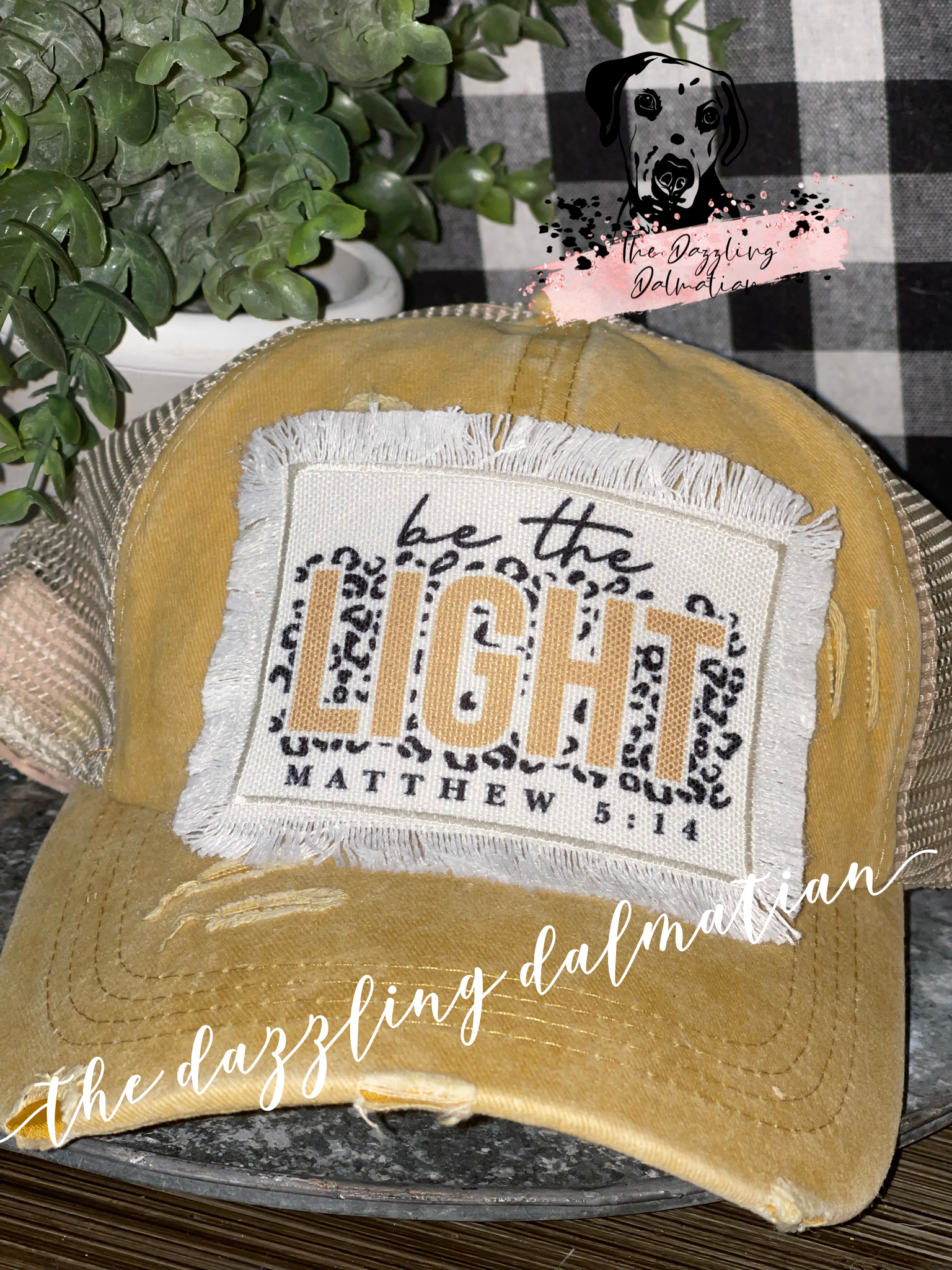 Be the light yellow distressed hat